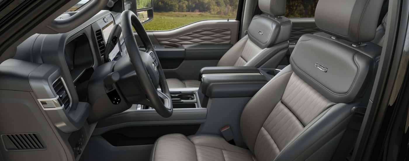 The grey leather interior is shown in a 2025 Ford F-250 Platinum.