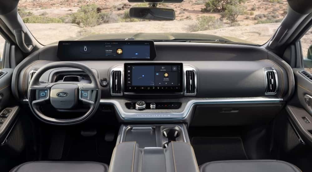 The interior of a 2025 Ford Expedition Tremor is shown after leaving a A green 2025 Ford Expedition Tremor is parked on a rock after leaving a Ford dealer near Decatur.