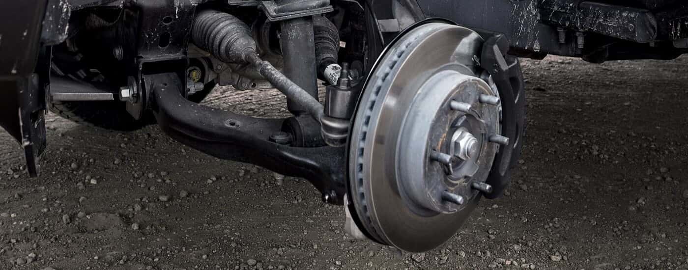 A close-up shows a silver rotor on a 2022 Ford Ranger.
