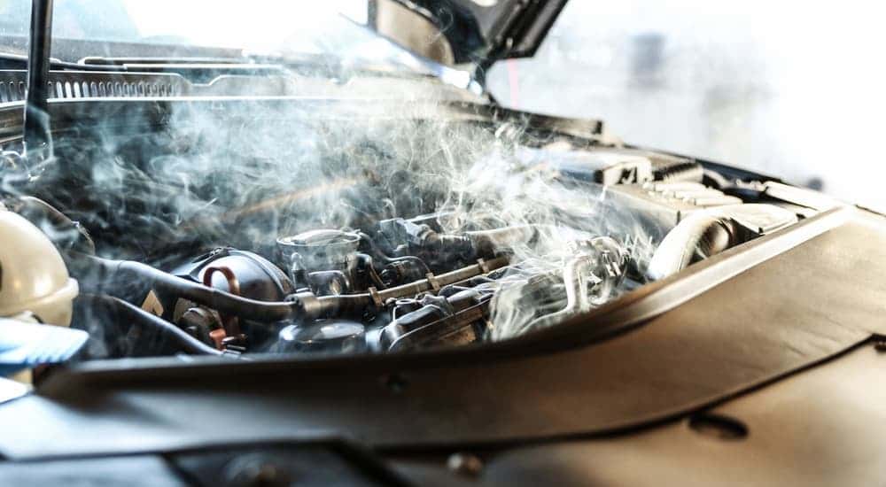 A car engine starting to smoke.
