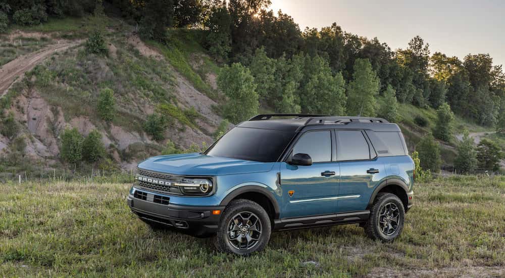 A blue 2025 Ford Bronco Sport is shown from the side.