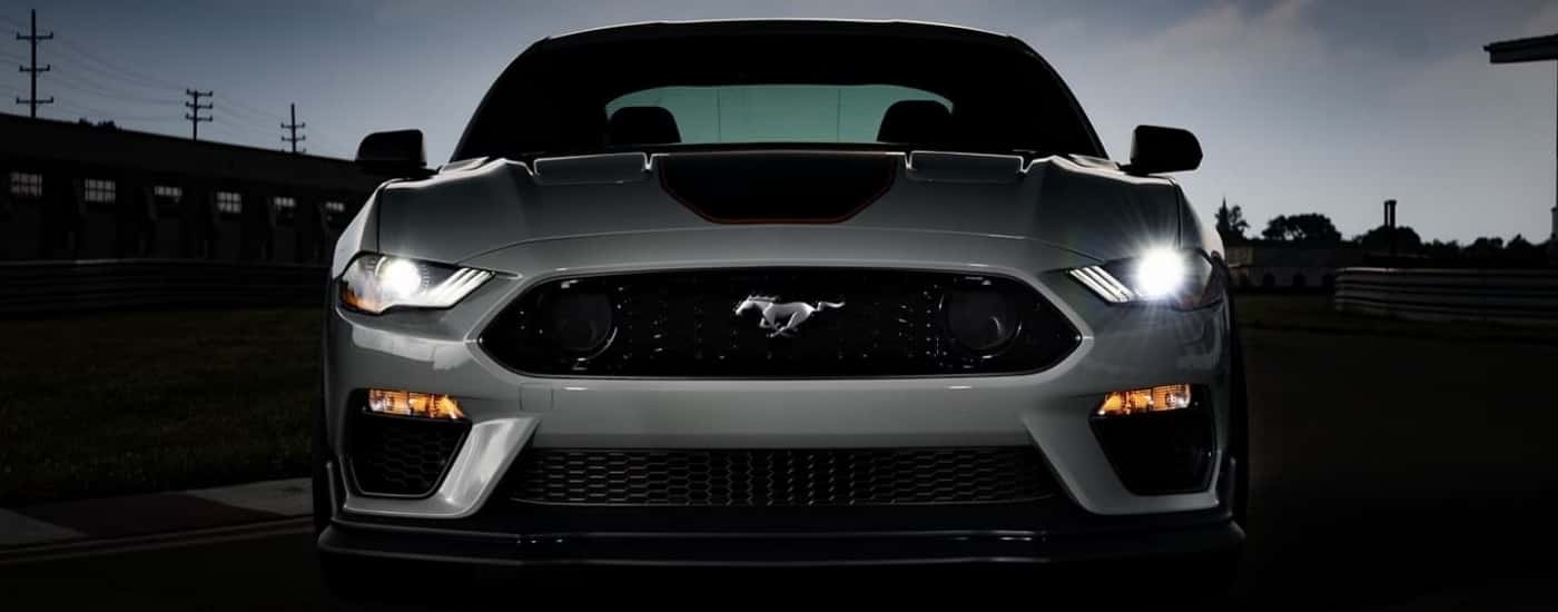A grey 2023 Ford Mustang Mach 1 is shown at night.
