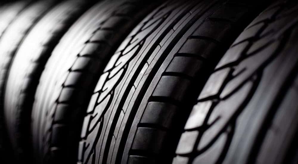 Close-up on a row of stacked tires.