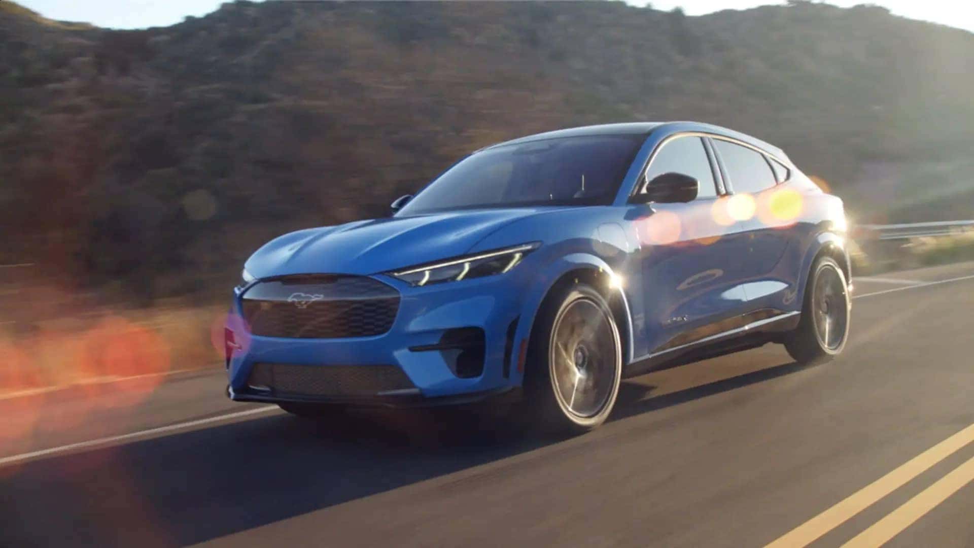 2021 Ford Mach-E driving down mountain road