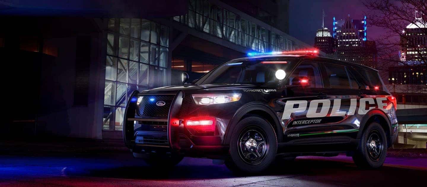 2021 Ford Police Utility parked with emergency lights flashing