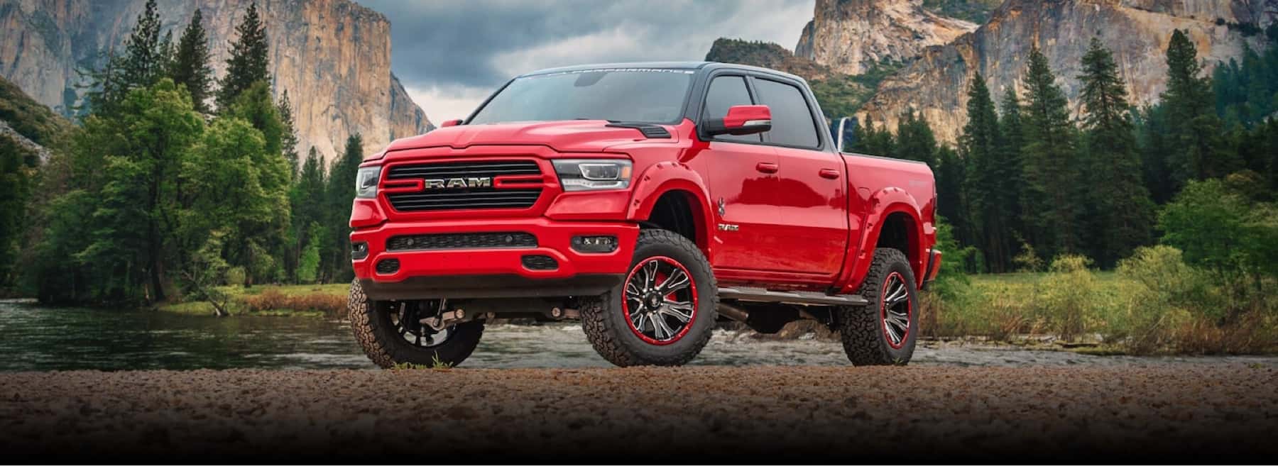 ram-lifted-truck-red-parked-in-mountains