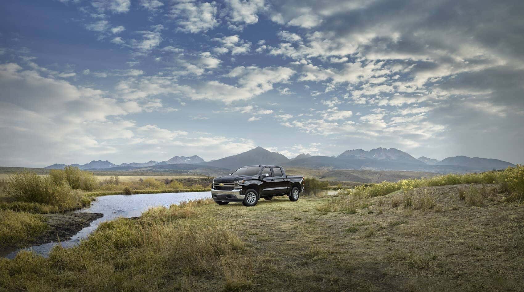 Chevy Truck parked in a field