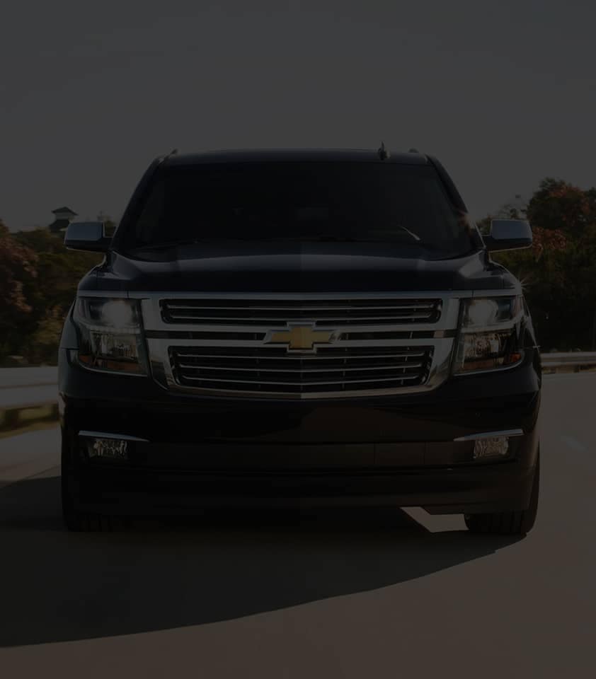 2020 Black Suburban Large SUV Front Grille View