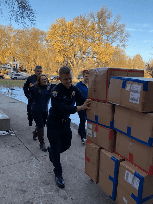 Firepeople delivering packages