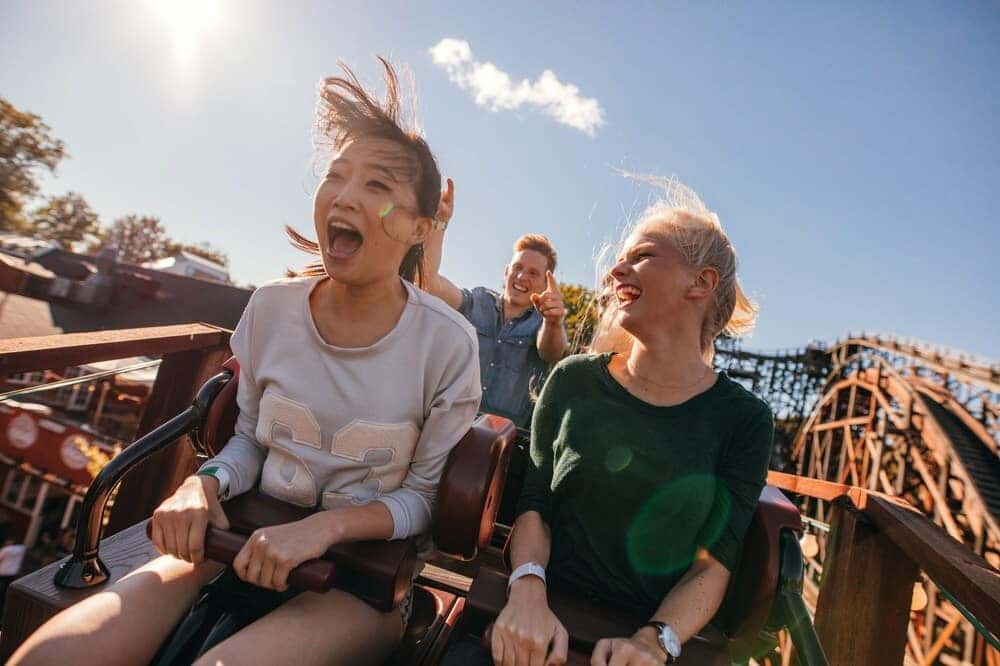 Friends Riding a Roller Coaster