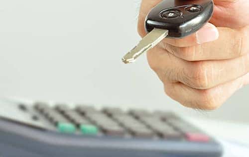 Key Fob with calculator in background