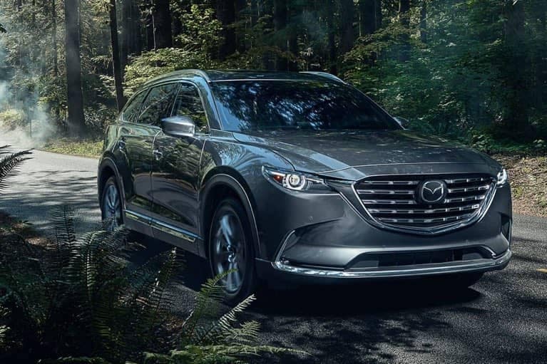 2021 Mazda CX-9 driving in the woods_mobile