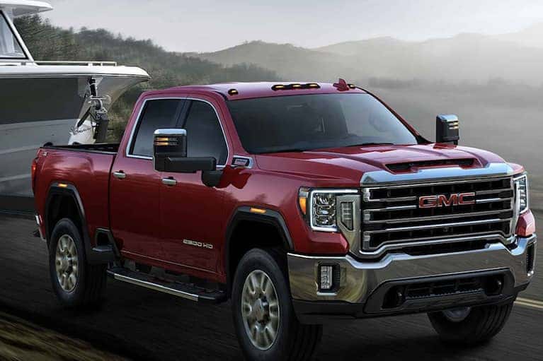 2023-GMC-Sierra-Heavy-Duty-towing-a-boat_mobile
