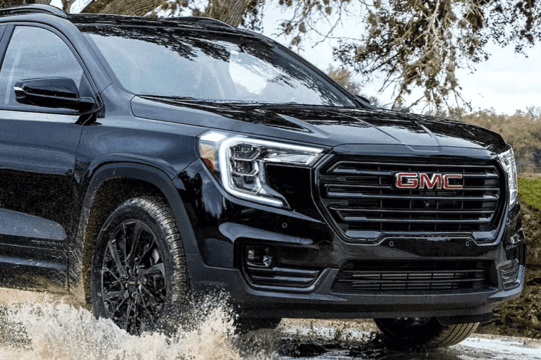 2023-GMC-Terrain-drives-through-sandy-puddle