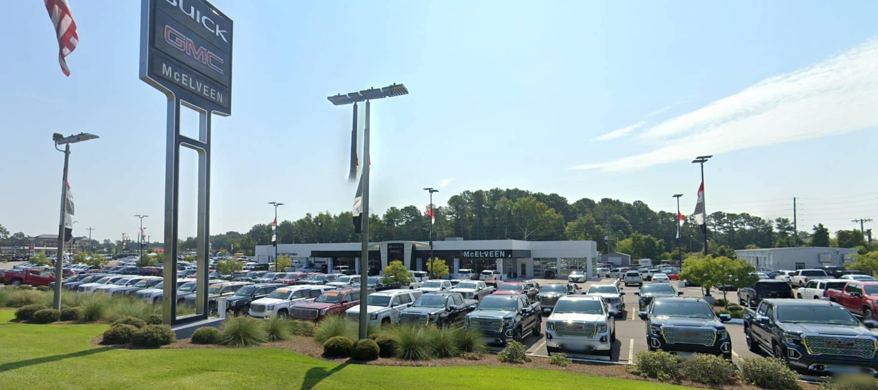An exterior shot of a McElveen Buick GMC dealership.