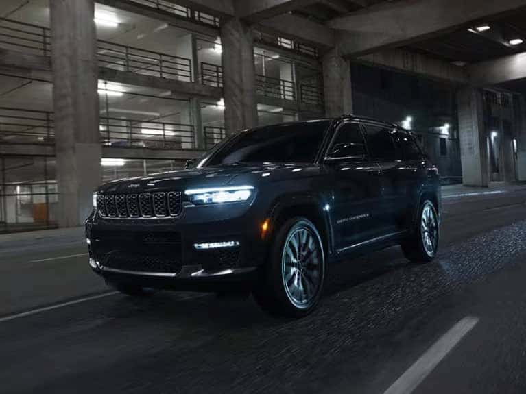 2025 Jeep Grand Cherokee L driving at night