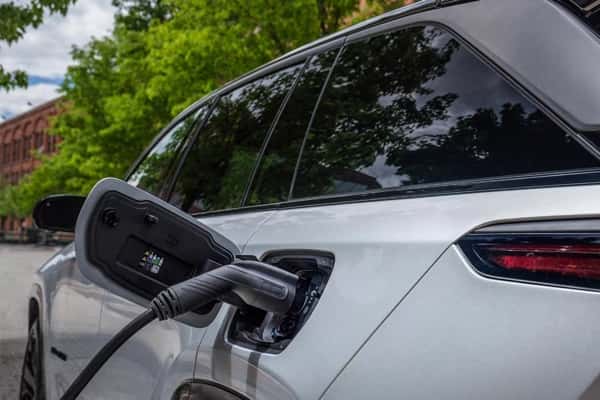 2025-Wagoneer-S-with-electric-charger-plugged-into-it