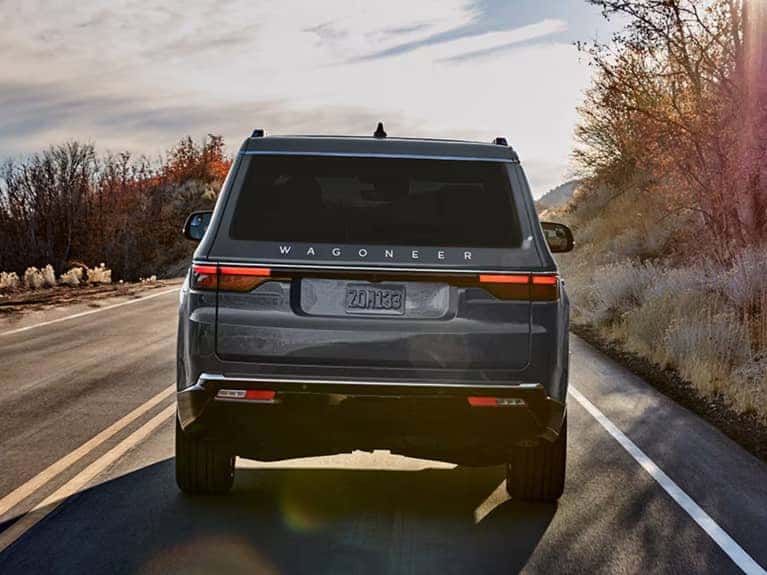 Jeep Wagoneer rear view driving