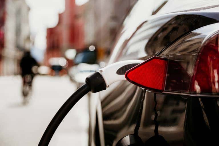 black-vehicle-connected-to-charger
