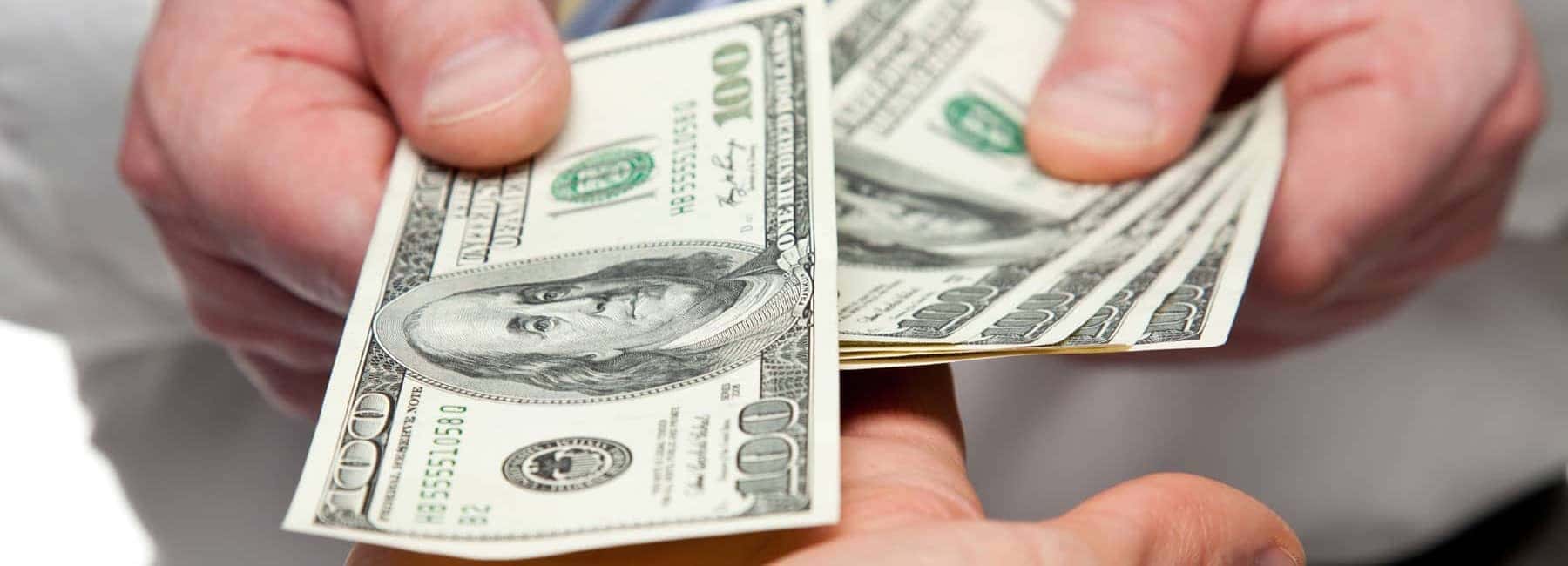 Hands Holding Money