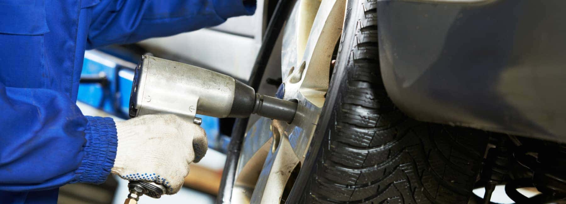 Service technician working on tires