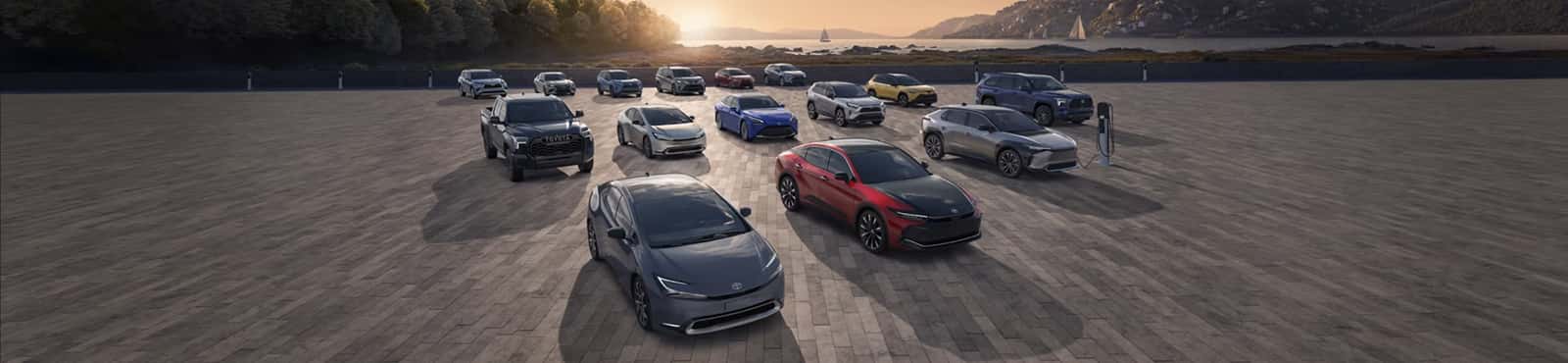 Toyota models with a sunset in the background