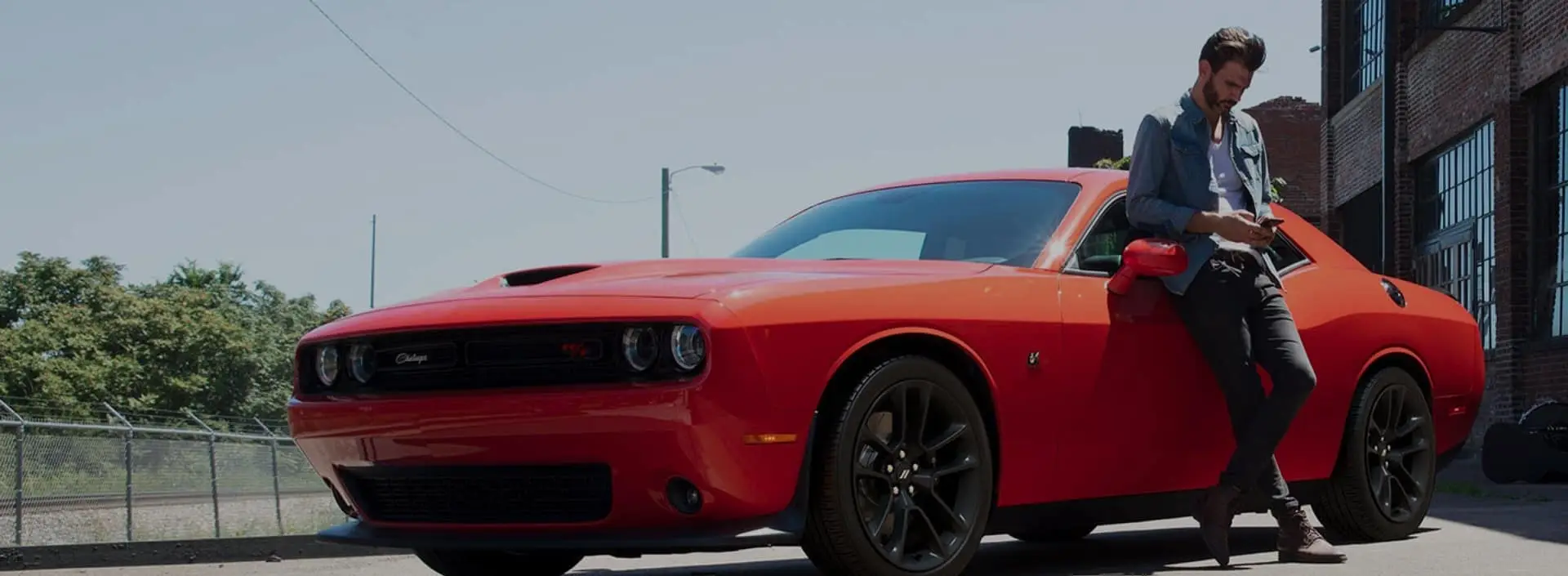 Red Dodge Challenger in Lot