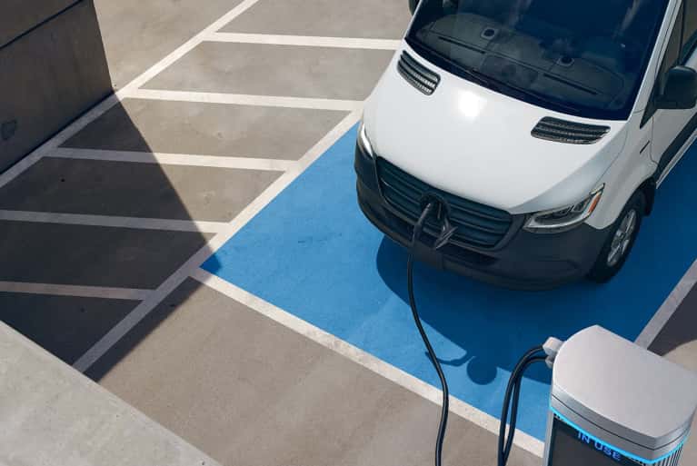 2023-Mercedes-Benz-E-Sprinter-parked-at-a-charging-station-mobile