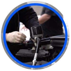 technician replacing oile