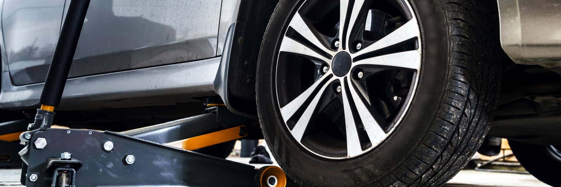 car-jack-next-to-tire