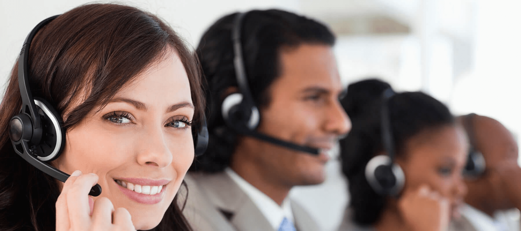 Customer service reps on headsets