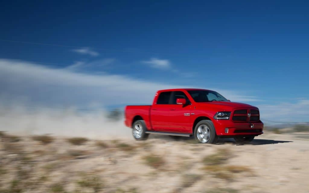2013-ram-1500-sport-front-three-quarters-in-motion-3
