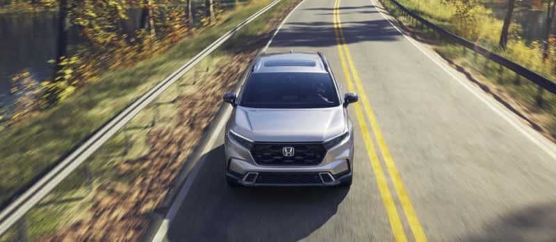 Front-shot-of-CR-V-driving-down-highway.