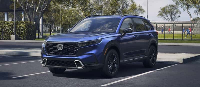 CR-V-parked-in-a-lot-outside-a-soccer-field.