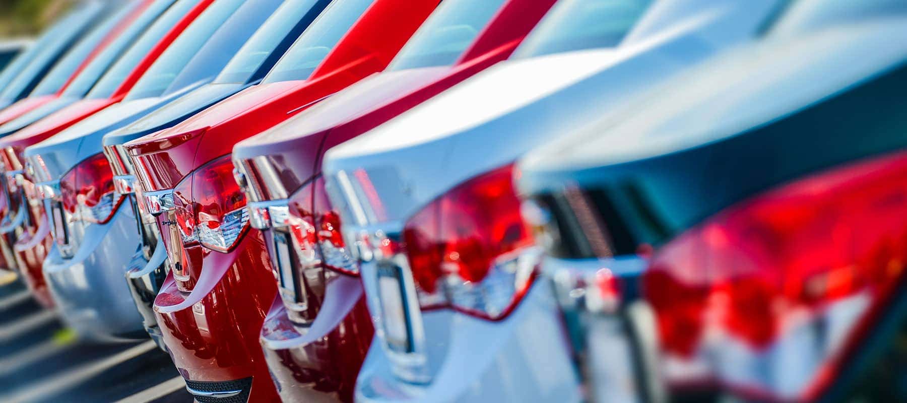 back-end-of-cars-lined-in-a-row