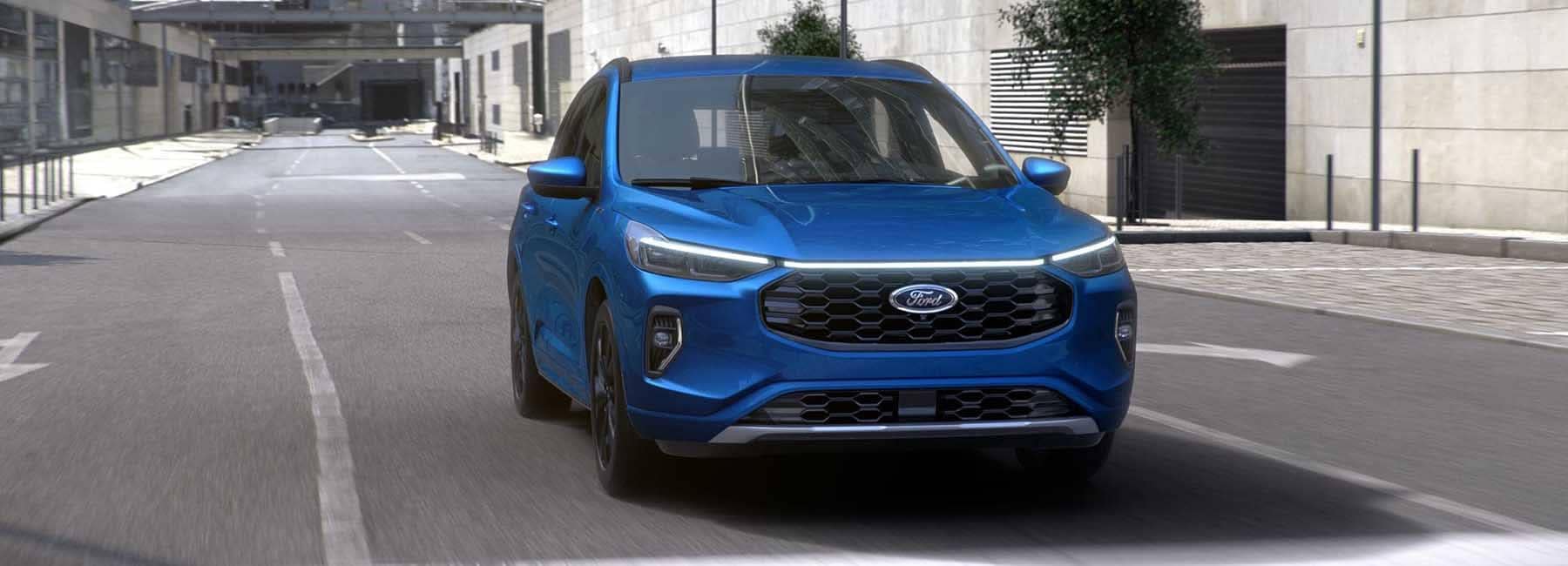 2023 Ford Ecosport driving down city road_mobile