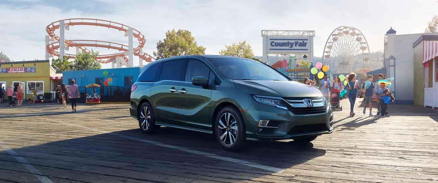 2018 Honda Odyssey parked outside an amusement park