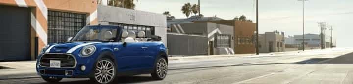 MINI-driving-down-city-street