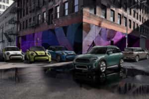 2023-mini-lined-up-in-front-of-downtown-brick-building-with-murals