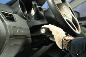 Side view of steering wheel with hand controls