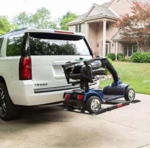 scooter lift bruno out sider on white suv