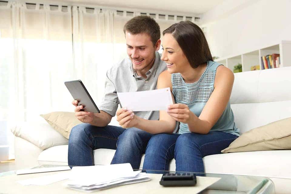 couple looking at tablet