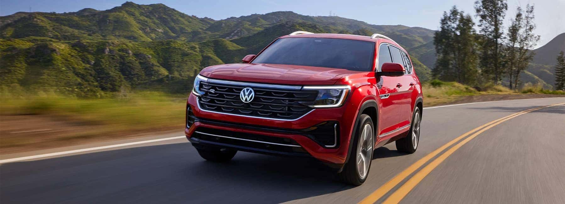 2024 Red Atlas on a secluded road front facing view