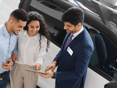 mullinax ford sales representative explaining news and updates