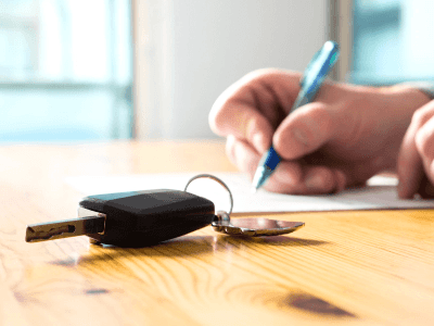 mullinax ford new customer signing trade in vehicle paperwork