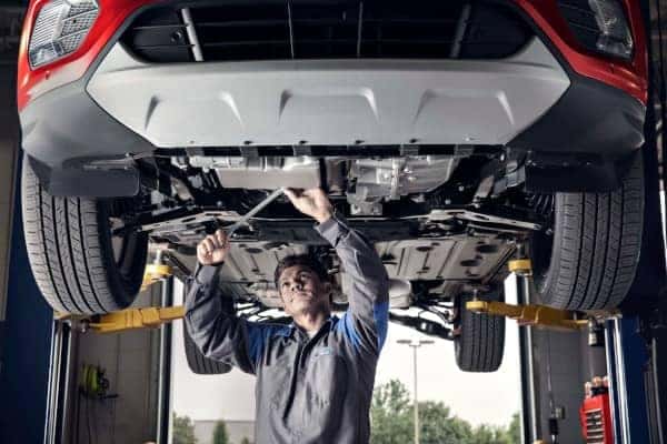 Man-working-under-a-car