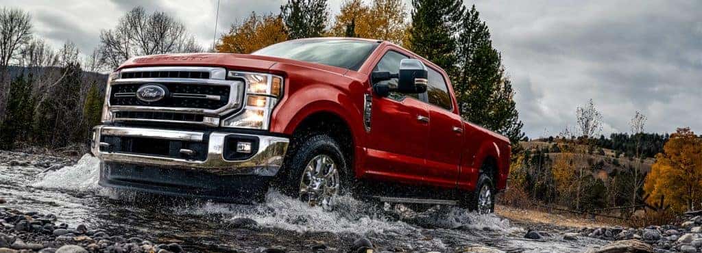 Red 2022 Ford Super Duty on a rocky pass