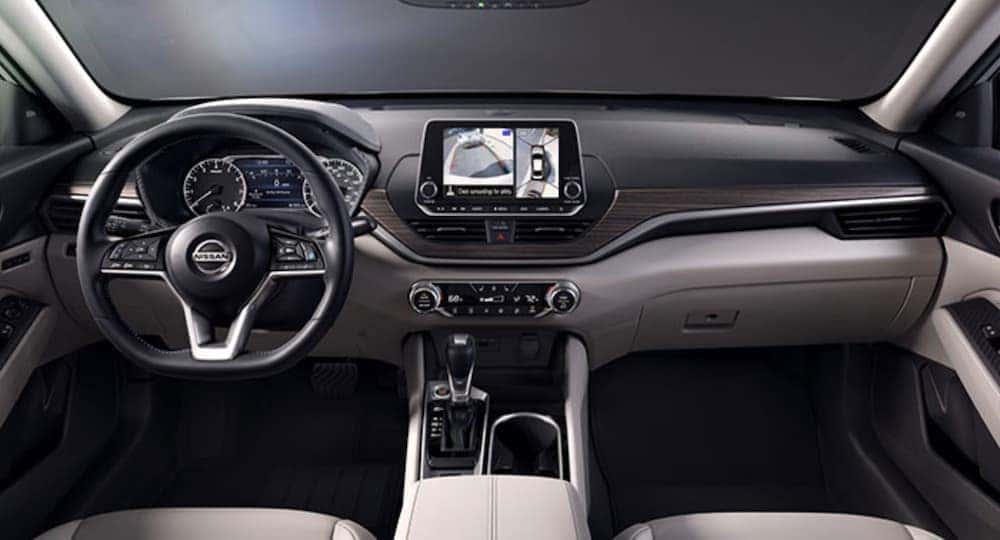 The grey and black interior is shown in a 2020 Nissan Altima.