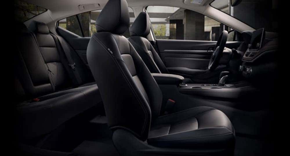 The black interior is shown from the side in a 2020 Nissan Altima.