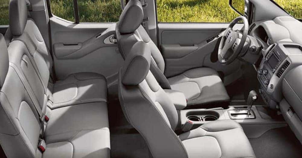 The grey interior of a 2020 Nissan Frontier is shown.